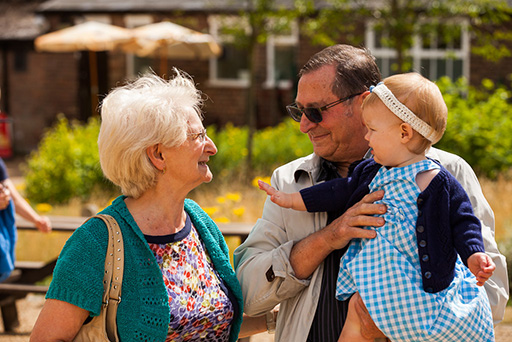 Granddad and grandma with baby